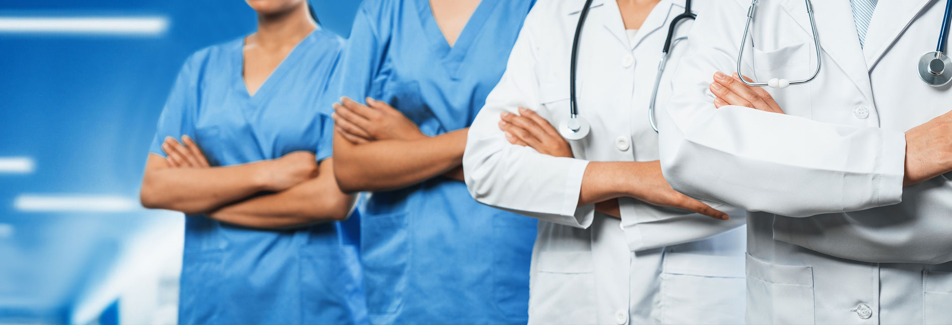 Hero banner - Confident medical staff team with doctor nurse and healthcare specialist professions people in hospital or clinic corridor